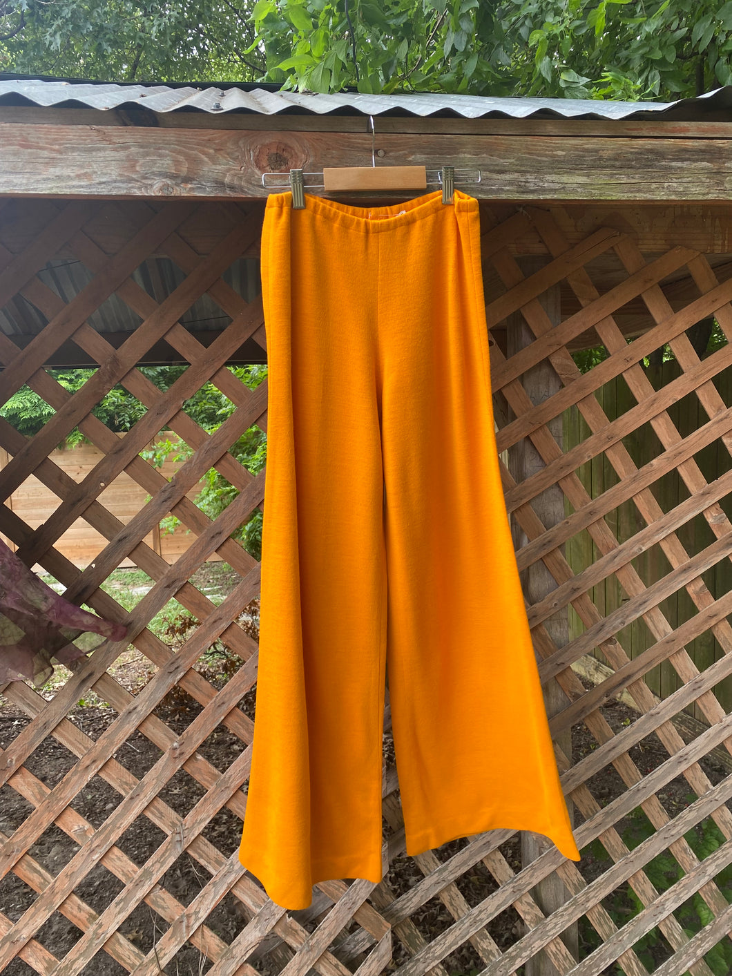 1970’s mid rise marigold poly flared pants